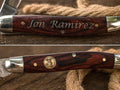 Personalized folding pocket knife with custom name engraving and wood-style handle